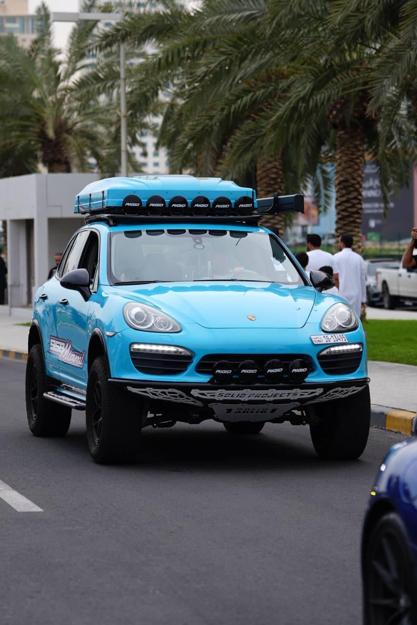 Cayenne 958 miami blue build from kuwait running akioverland bespoke nitrogen coilovers & custom front bumper by solid projects kuwait