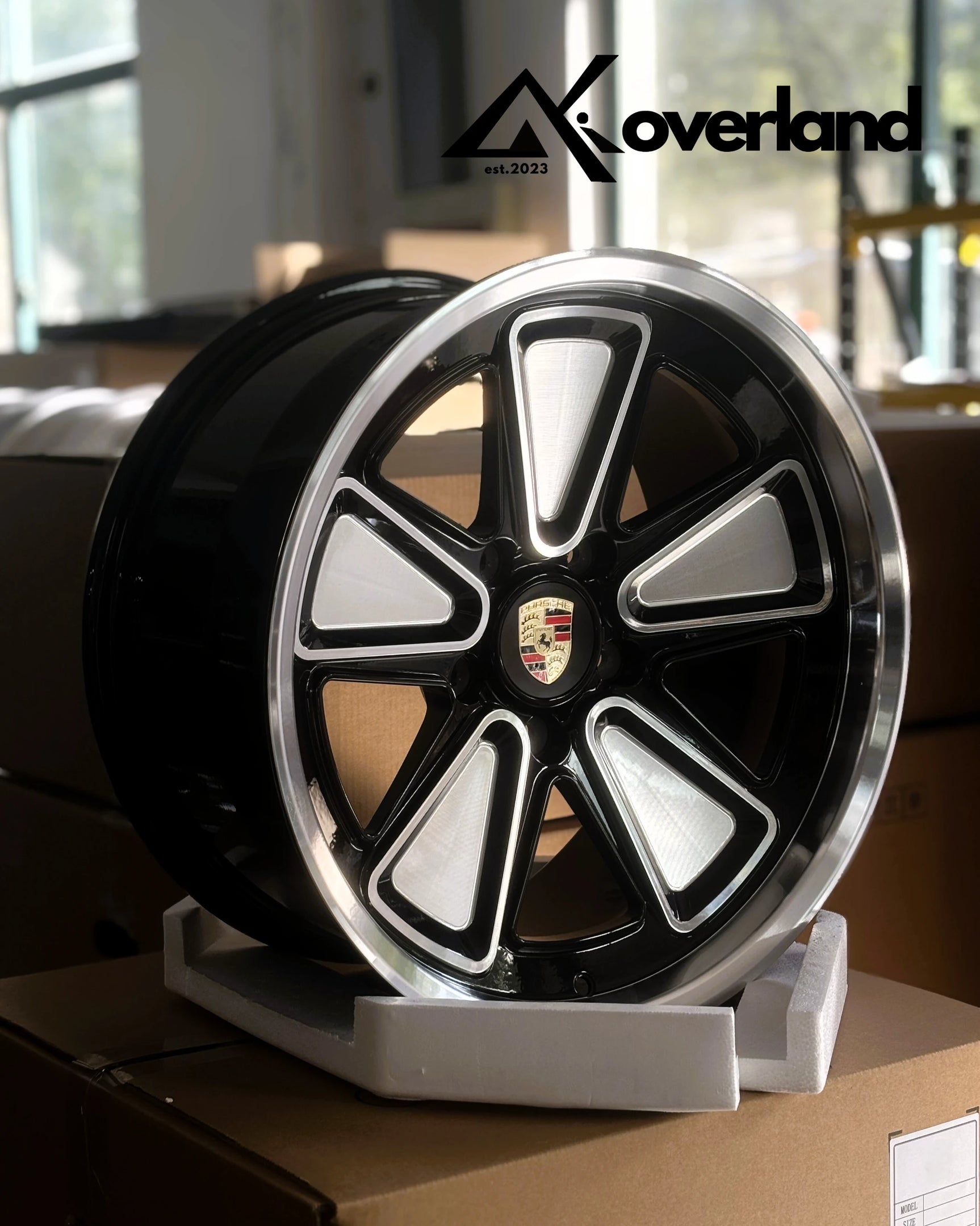 Custom Porsche forged wheels in 5x130 fitment, reinterpreting the classic Fuchs design with modern engineering