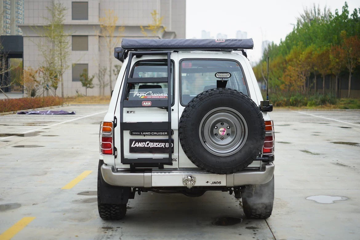 LC80 off-road spare tire carrier light and flag mount – Universal fitment bracket for chase lights and flag poles.