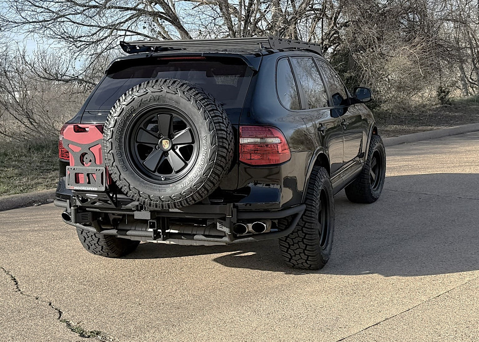 Blackout Porsche Cayenne 957 gts offroad Tubular bumper with swing out tire carrier.
