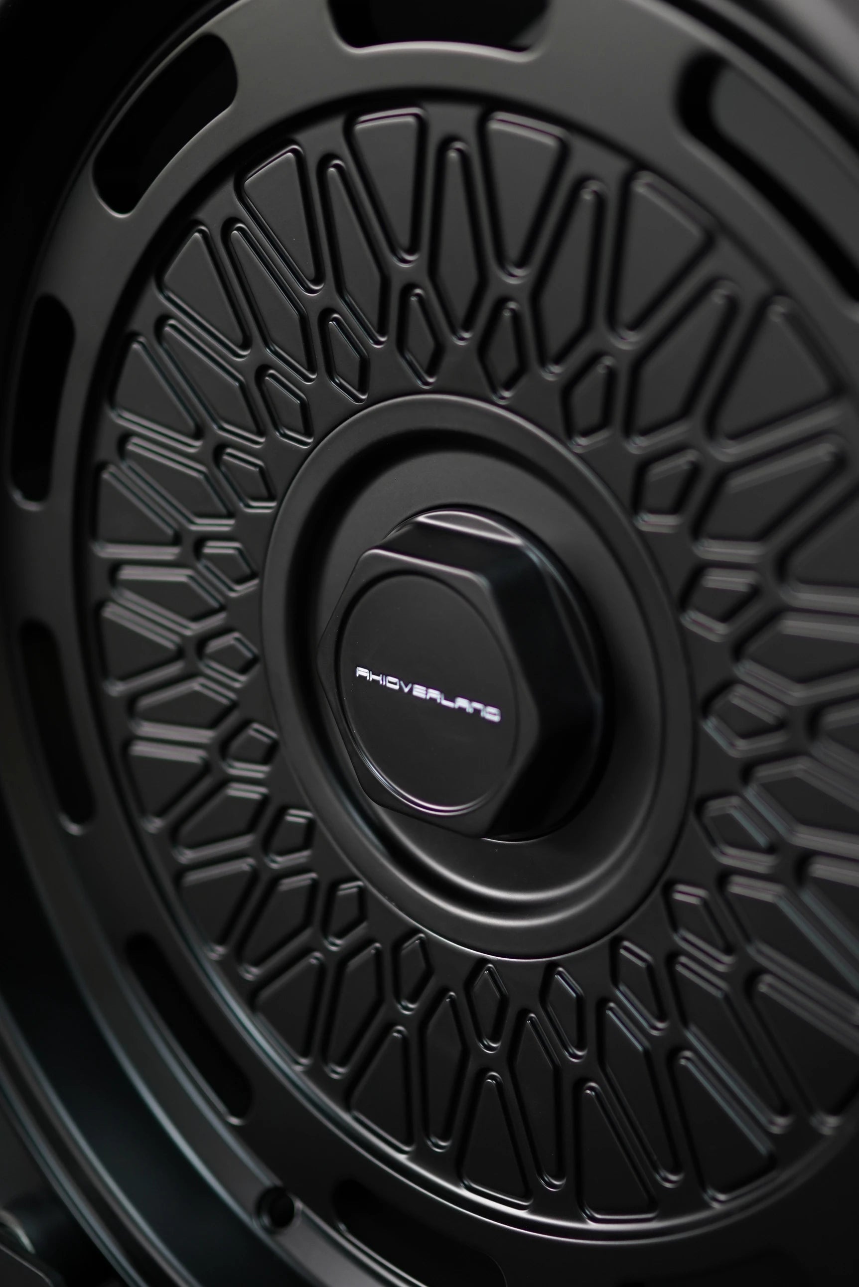 Close-up detail of AkiOverland 5x130 mesh wheel pattern in matte black – precision design for offroad fitments.