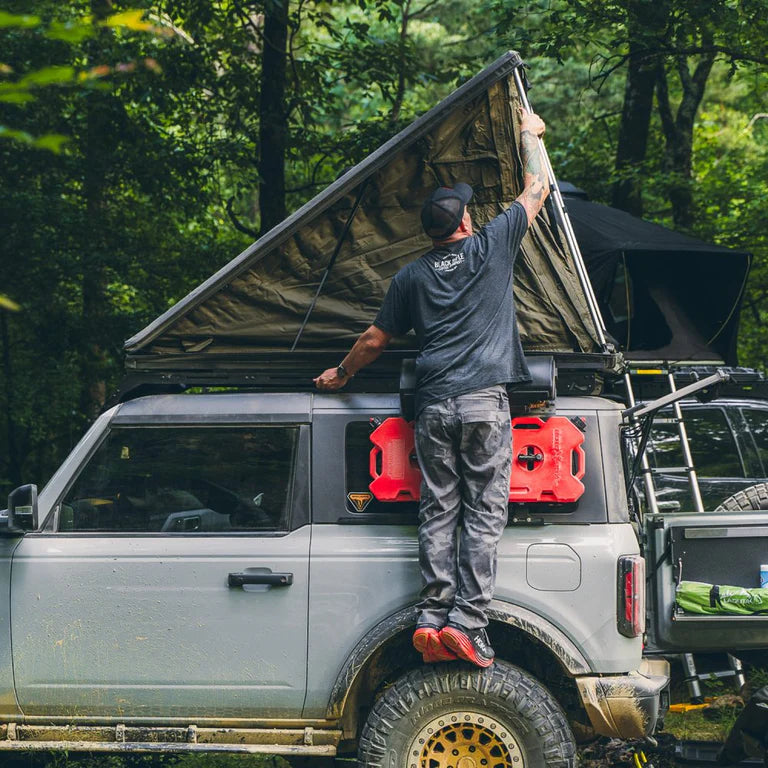 inspired overland lightweight rooftop tent mounted on Ford bronco 2025 overland build in forest