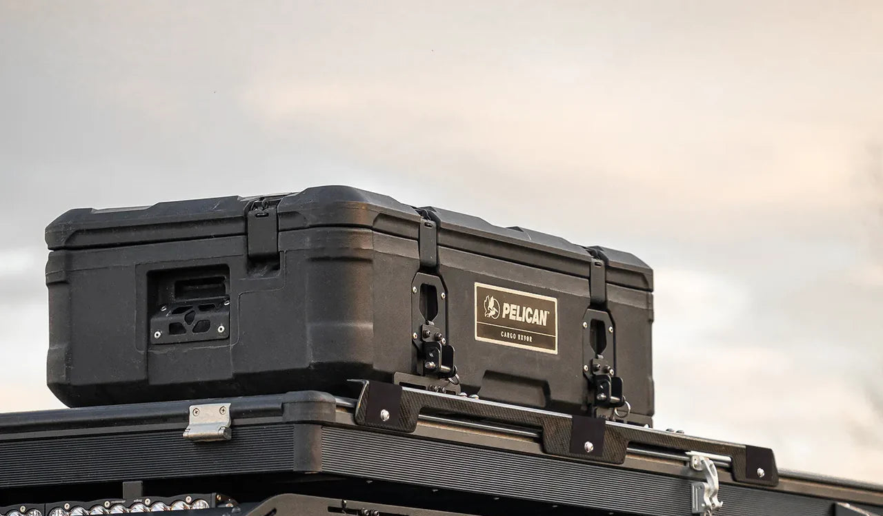 Inspired Overland rooftop tent crossbar installed with Pelican storage case overland travel