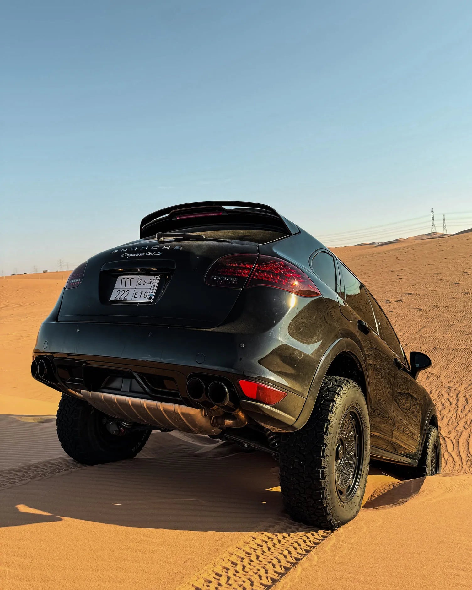 Lifted Porsche Cayenne 958 GTS fitted with Akioverland 5x130 Aki Forged 04 Mesh wheels, driving in the desert