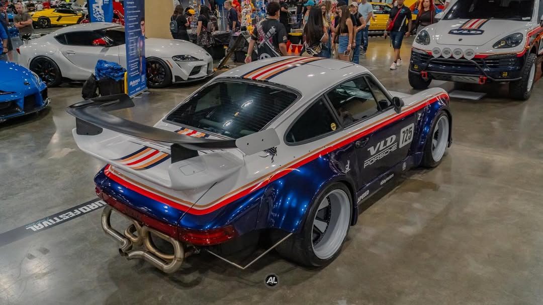 Widebody Porsche 911 964 build showing AkiOverland VLD 2-piece Fuchs wheel fitment and stance