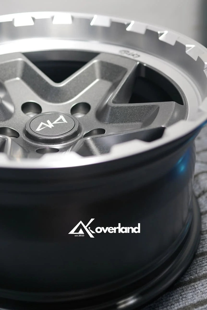 Akioverland 5x130 Forged Cookie Cutter Rugged wheel in 2 Tone finish, close three-quarter view with the machined lip highlighted