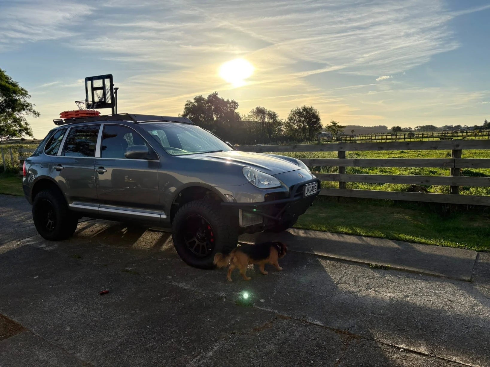 Porsche Cayenne 955 Turbo lifted with roof rack driveway view