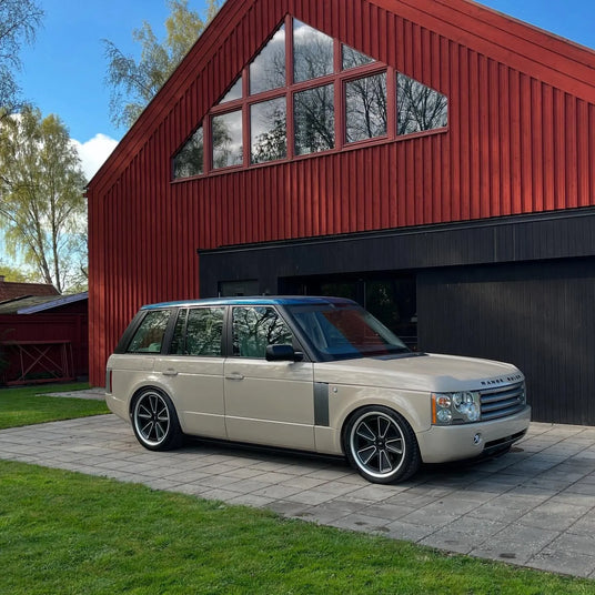 Tesla platform on Range Rover L322 using fuchs reimagined forge wheels