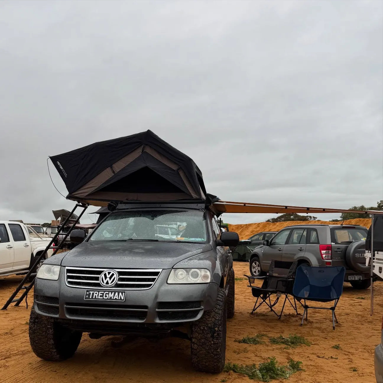 VW Touareg 7L with rooftop tent and super slim roof rack lifted overland build