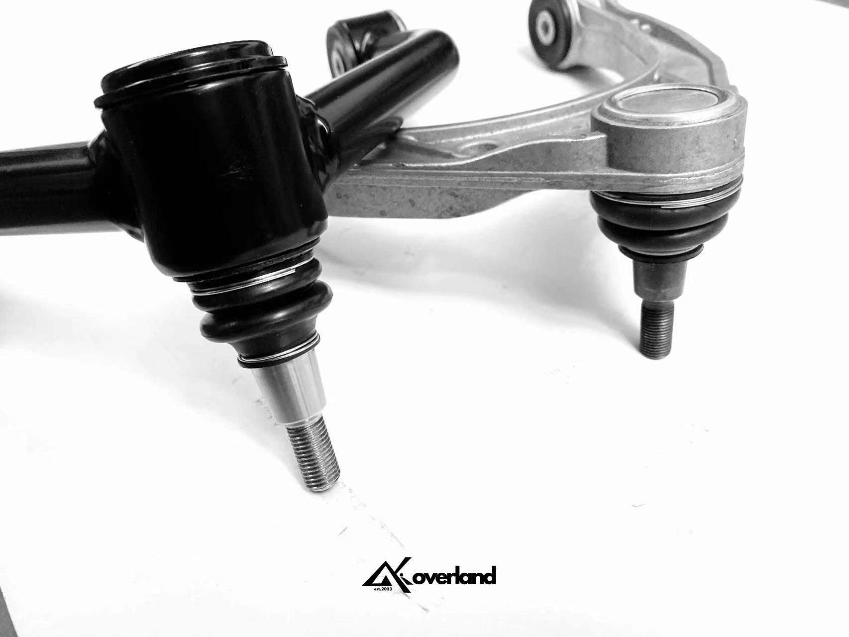Precision-machined ball joint housing on Akioverland UCA engineered for 3-inch and 3.5-inch lift compatibility on Touareg 7L/7P and Porsche 957.