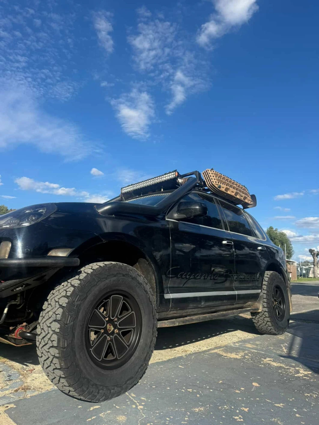 akioverland 5x130 fuch reimagined wheels on 957 cayenne transaustralia build, with roof rack, tubular bumpers and snorkle