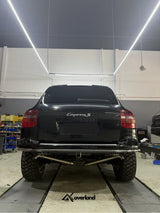 Akioverland single tubular rear bumper installed on Porsche Cayenne 957 showing high-clearance departure angle for off-road performance