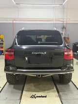 Akioverland single tubular rear bumper installed on Porsche Cayenne 957 showing high-clearance departure angle for off-road performance
