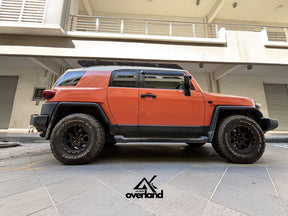 Orange Toyota FJ Cruiser with akioverland super slim modular roof rack