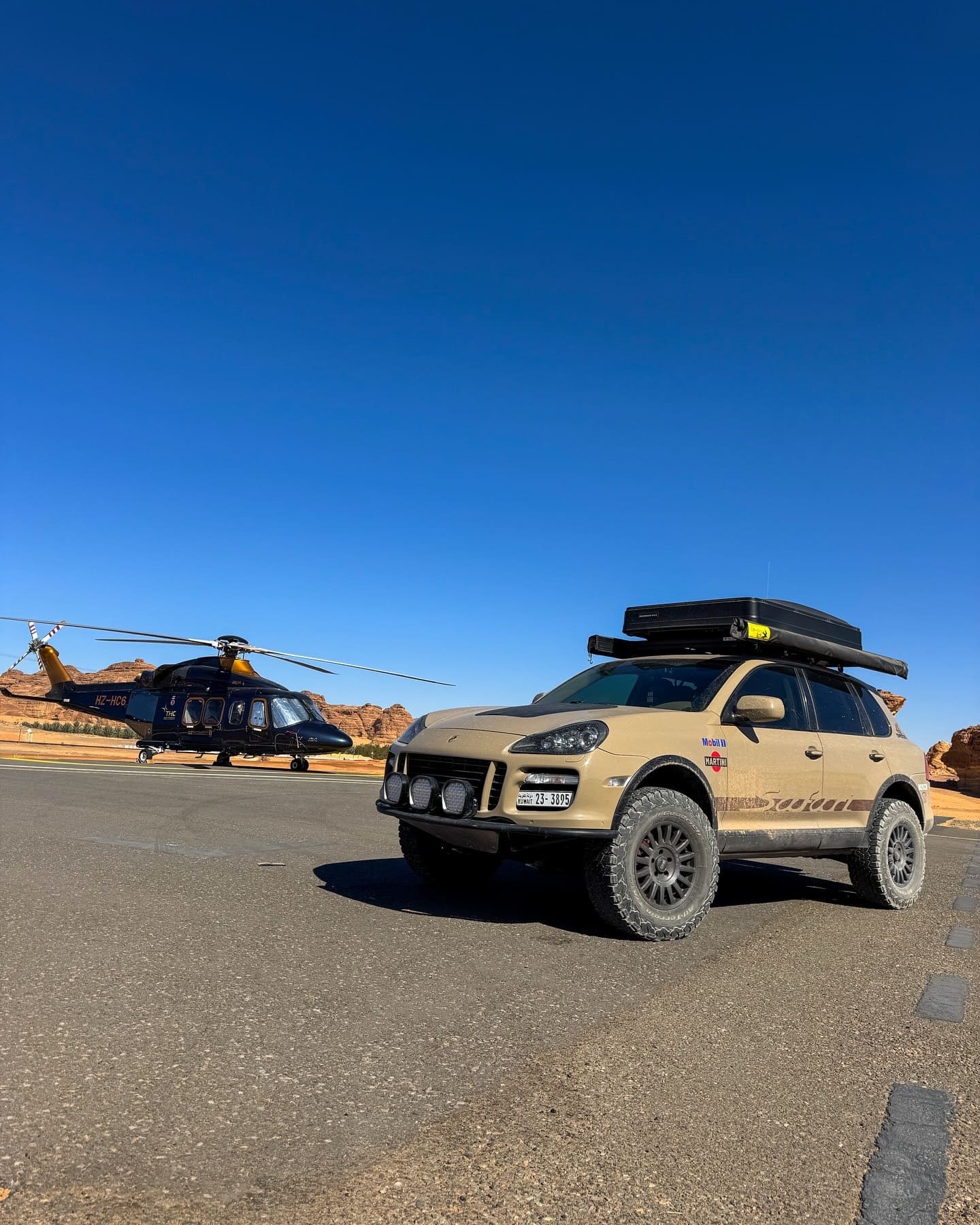 sand colour safari cayenne 957 with helicopter in saudi arabia