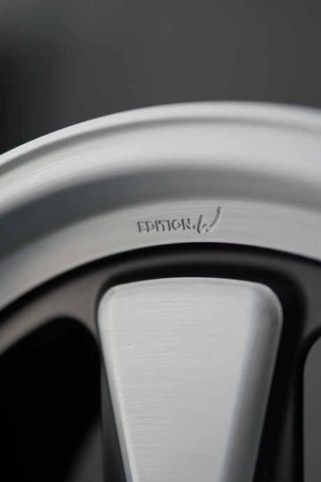 Close-up of brushed spoke detailing on Edition W forged Porsche 5x130 wheel.