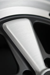 Three-quarter angle of Edition W forged wheel for Porsche 5x130 with classic five-spoke layout.