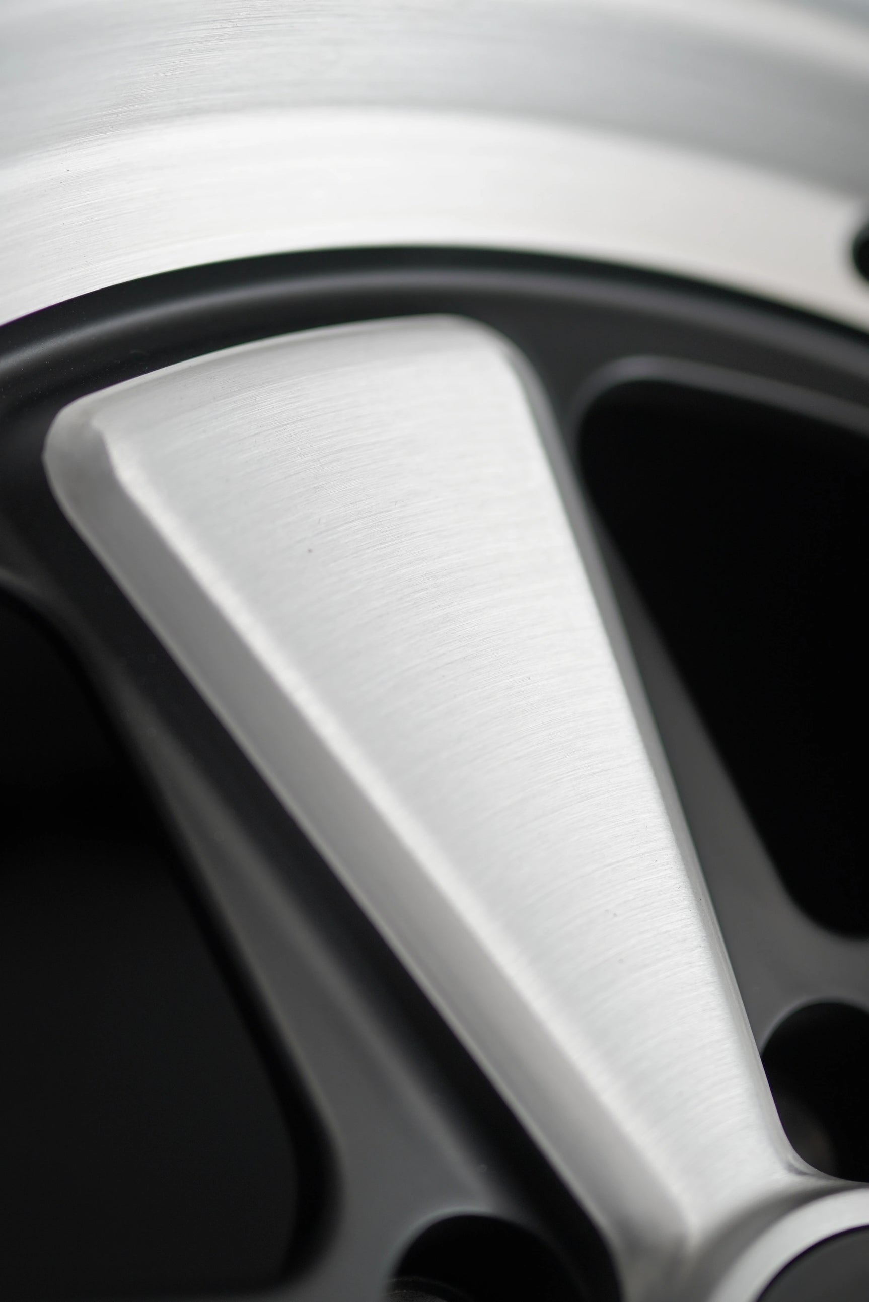 Three-quarter angle of Edition W forged wheel for Porsche 5x130 with classic five-spoke layout.