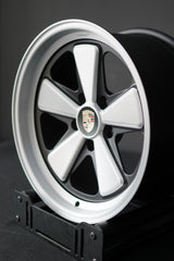Three-quarter angle of Edition W forged wheel for Porsche 5x130 with classic five-spoke layout.