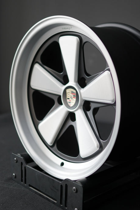 Three-quarter angle of Edition W forged wheel for Porsche 5x130 with classic five-spoke layout.