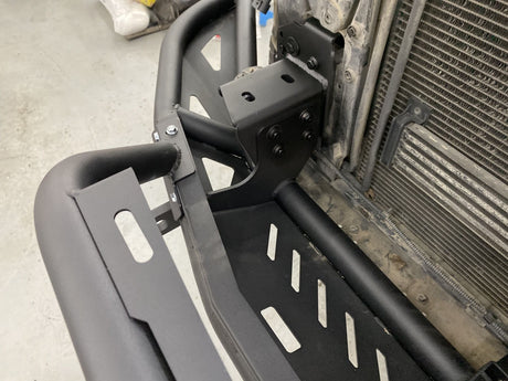 Close-up of heavy-duty Cayenne 955 off-road bumper with detachable bull bar
