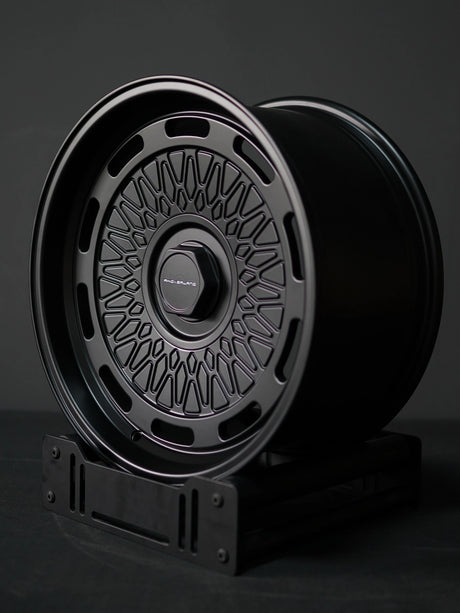 Side view of AkiOverland 5x130 mesh wheels in black finish for Porsche, VW, Audi vehicles – offroad wheel upgrade.