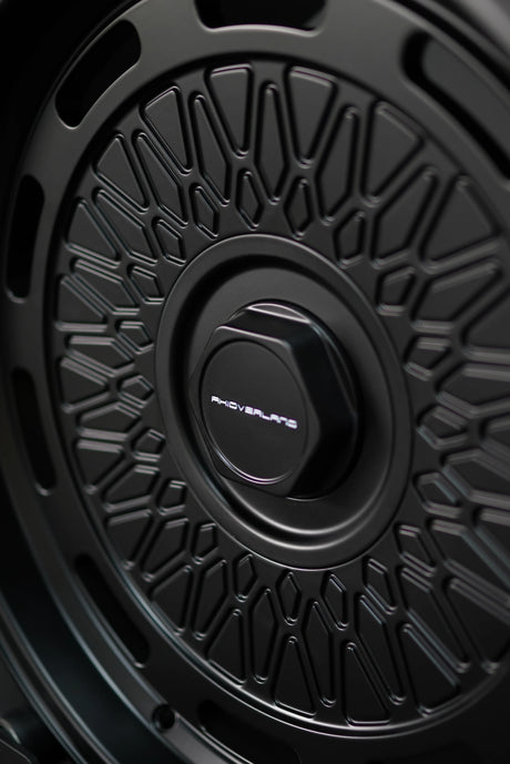 Close-up detail of AkiOverland 5x130 mesh wheel pattern in matte black – precision design for offroad fitments.