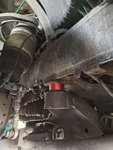 akioverland Porsche cayenne 957 with 1 inch subframe drop installed.