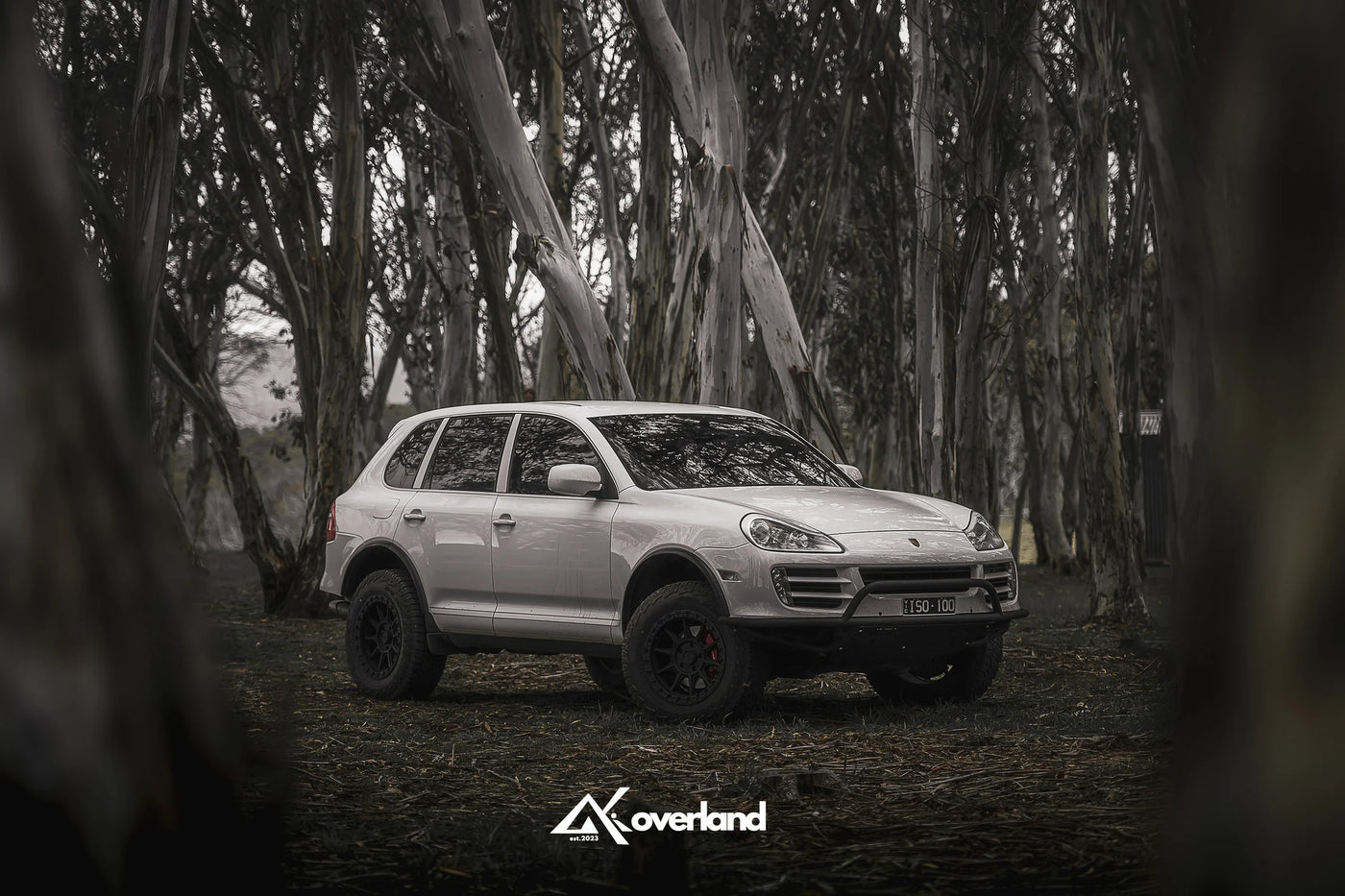 Lifted Porsche Cayenne 957 3.0 diesel featuring AkiOverland steel spring suspension lift, corrected subframe geometry and off-road tubular bumper, Australian overland build
