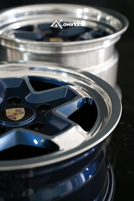 Custom 5x130 2-piece cookie cutter wheel with machined polished lip and midnight blue finish, AkiOverland forged