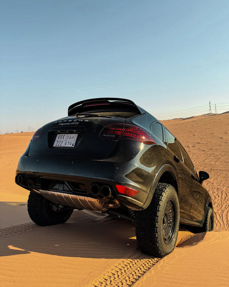 Lifted Porsche Cayenne 958 GTS fitted with Akioverland 5x130 Aki Forged 04 Mesh wheels, driving in the desert