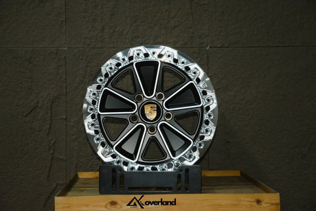 Akioverland 5x130 Beadlock Fuchs Reimagined forged aluminum monoblock wheel on a lifted Porsche Cayenne build