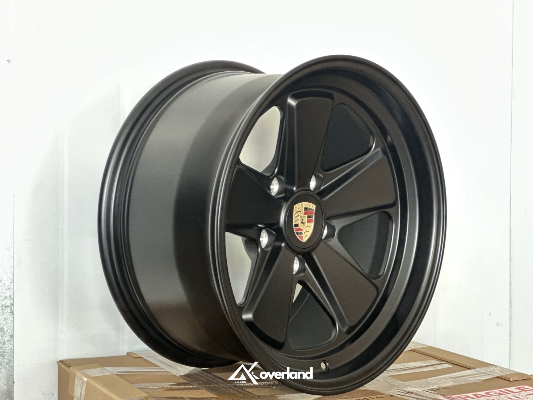 Porsche 5x130 forged off-road wheel in matte black finish by Akioverland, Fuchs-style design for Cayenne, Touareg, and Q7