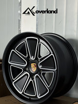 Custom Porsche forged wheels available in multiple finishes, 5x130 bolt pattern with reimagined Fuchs-inspired design