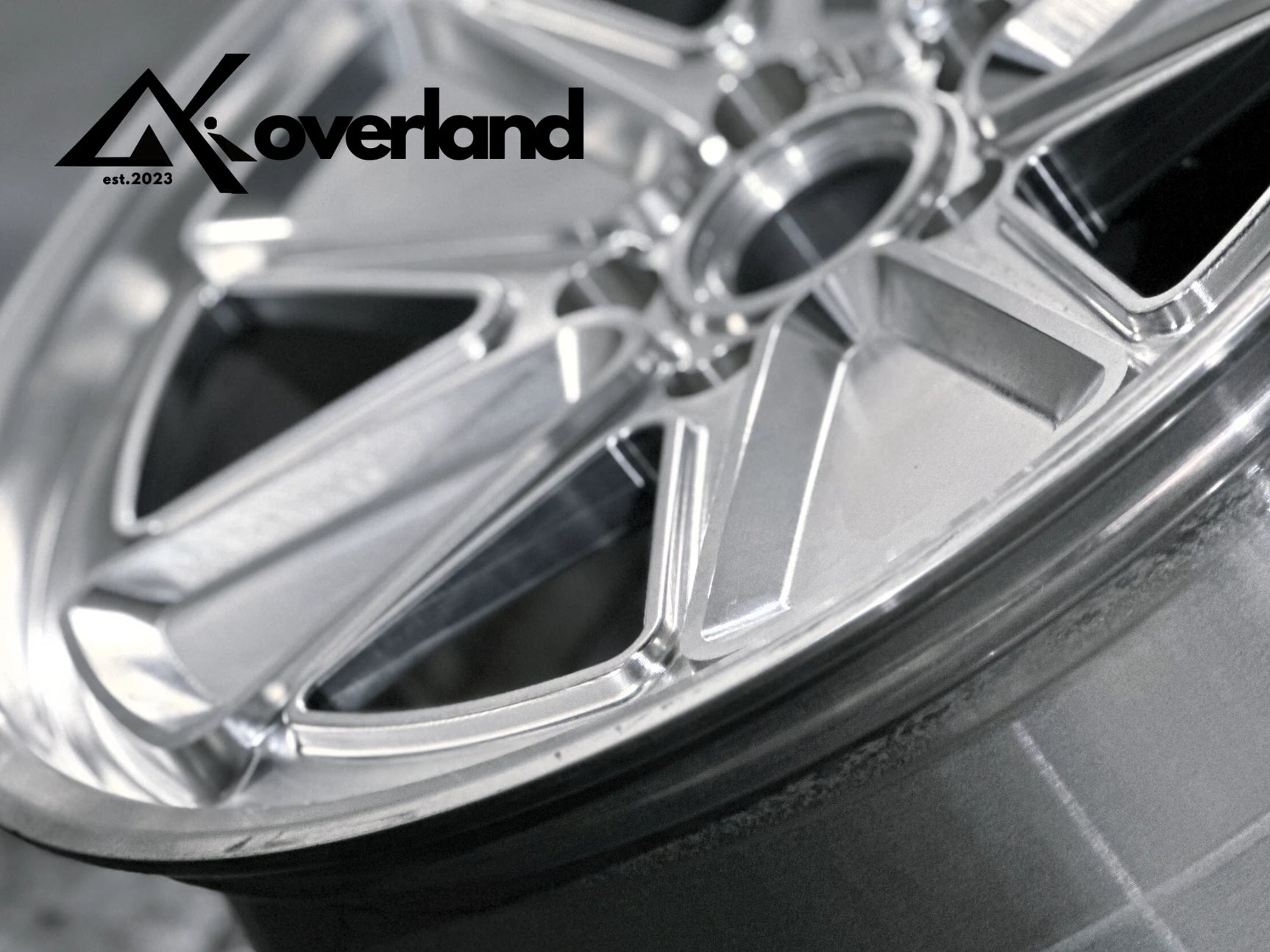 Detail shot of an Akioverland 5x130 Fuchs Reimagined forged wheel showing the machined face