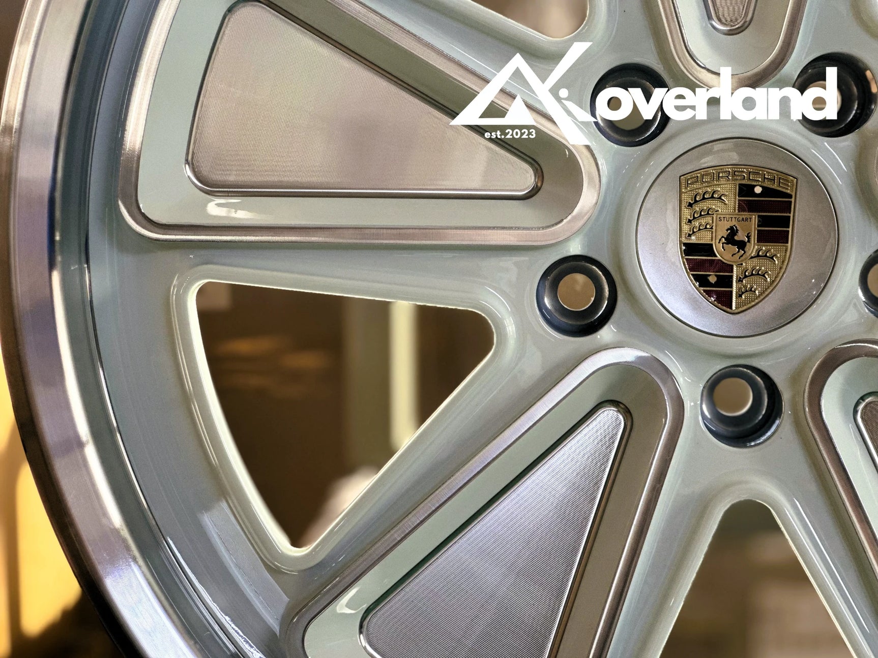 Detailed CNC machining on an Akioverland 5x130 Fuchs Reimagined forged wheel, highlighting sharp edges and precision finishing