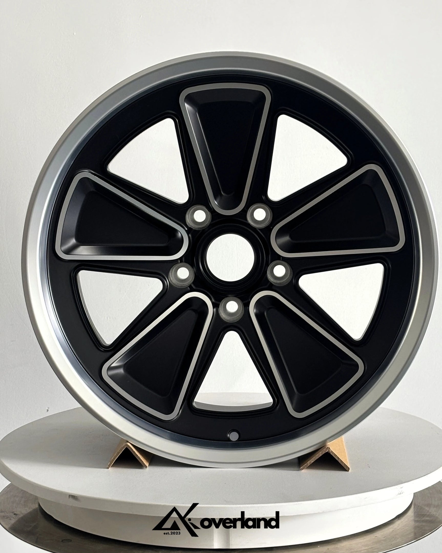 Akioverland 5x130 Fuchs Reimagined forged wheel photographed in studio, featuring high-precision CNC-machined surfaces
