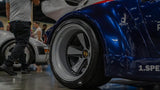 Satin Crayon grey VLD 2-piece forged Fuchs wheels on a liveried widebody Porsche 964, AkiOverland