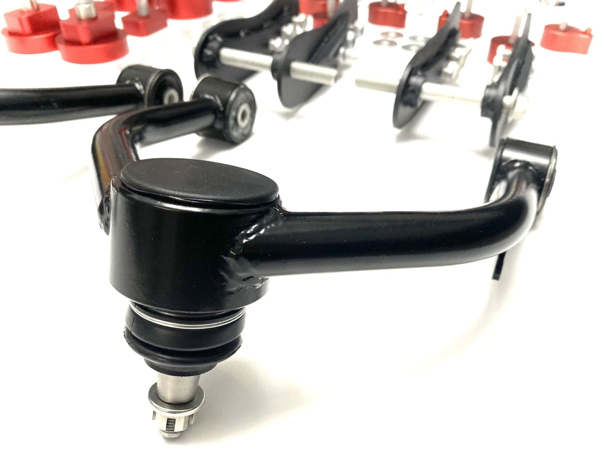 Serviceable ball joint on an Akioverland UCA, restoring camber and caster during extreme suspension travel