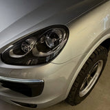 AkiOverland Classic Fuchs wheels in 2 Tone machined lip and satin spoke finish on a lifted Cayenne 958 in silver