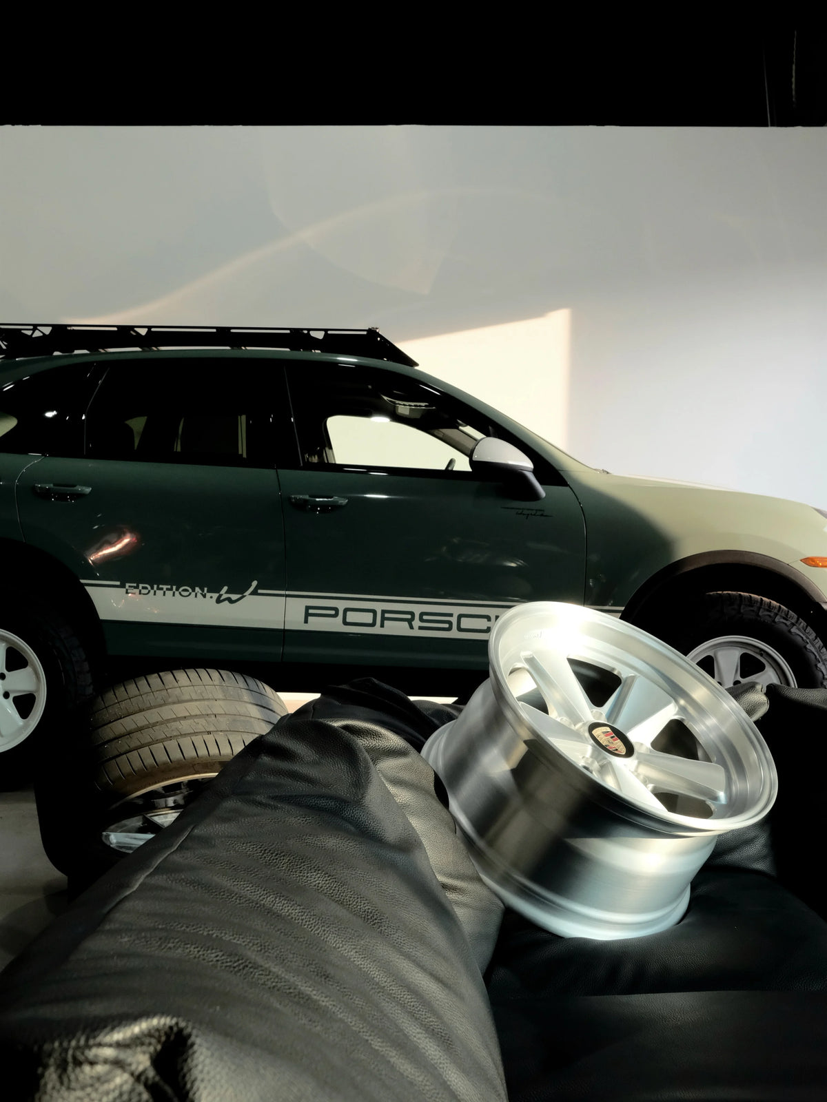 Cream white Edition W forged Fuchs-style wheels by AkiOverland fitted to the WrapWorkz Cayenne 958 overland build