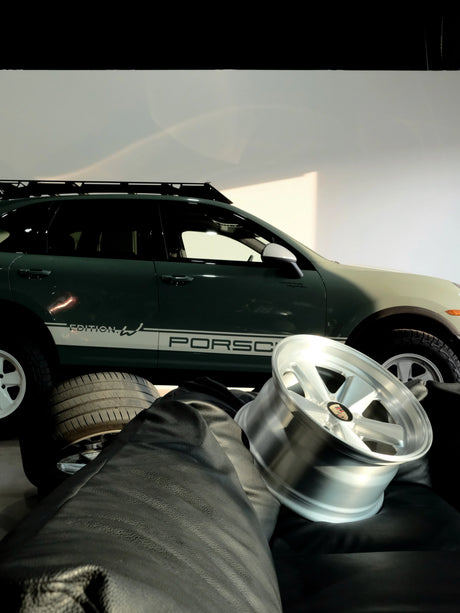 Cream white Edition W forged Fuchs-style wheels by AkiOverland fitted to the WrapWorkz Cayenne 958 overland build