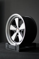 Brushed details on the AkiOverland Edition W 5x130 wheel showing deep spoke curvature and modern Fuchs styling