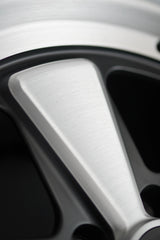 Three-quarter studio view of the AkiOverland Edition W forged wheel for Porsche 5x130 with classic five-spoke layout