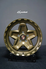 Akioverland 5x130 Forged Cookie Cutter Rugged wheel in special Bronze with Hidden Green finish, face-on view of the wheel face and center cap