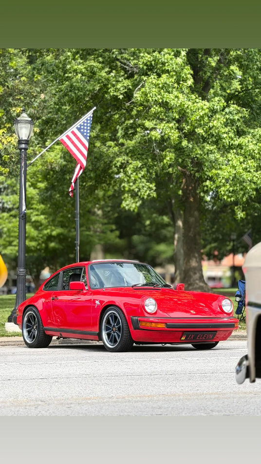 1982 Porsche 911 SC in Guards Red on AkiOverland 5x130 Fuchs Reimagined wheels at a US classic car meet
