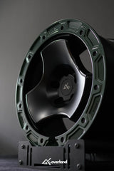 Akioverland Peaks 5x120 forged trispoke wheel in studio setting for range rovers