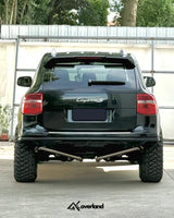 High-clearance rear bumper mounted on Cayenne 957 after lower plastic trim removal to maximize departure angle.