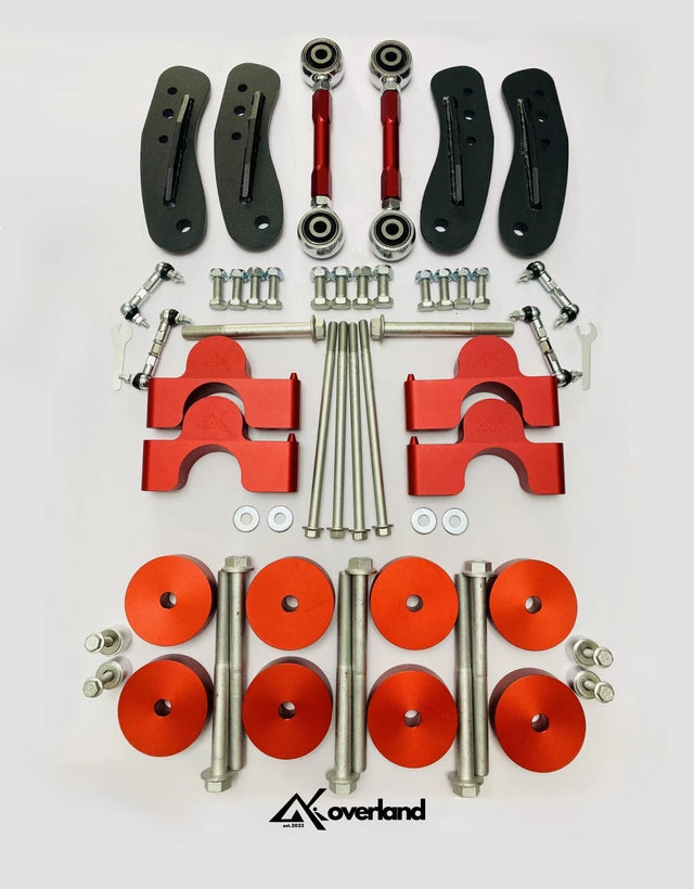 Akioverland 2.5-inch air suspension lift kit for Porsche Cayenne 958 and Touareg 7P showcasing V1 subframe drop spacers, AKI-stamped bolts, and precision height-specific lift engineering