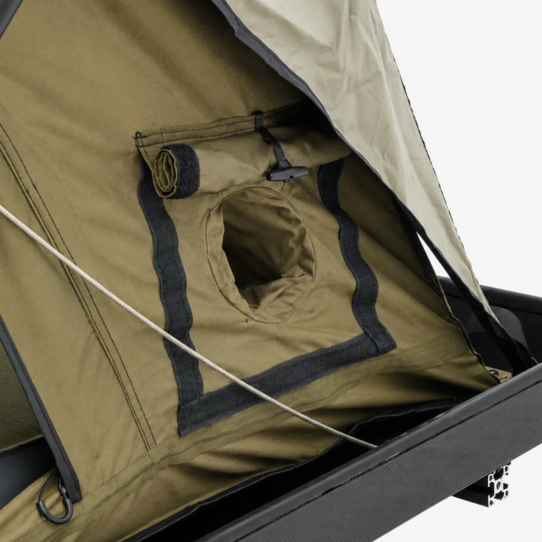 Carbonlite King rooftop tent insulated diesel heater port by Inspired Overland